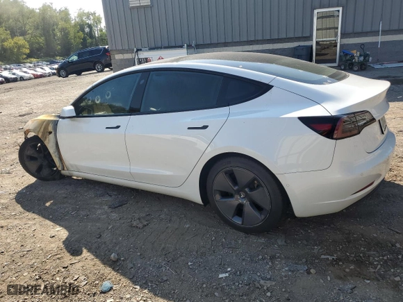 2021 Tesla Model 3 Standard Range Plus with VIN 5YJ3E1EA5MF082580, listed as a Copart auction lot 70601674 with 0 mi miles and Salvage Title. Bid and sale history available at carsss.com. Image 2.