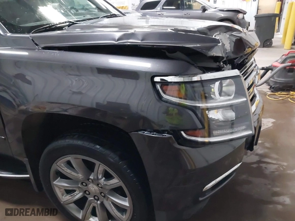 2016 Chevrolet Tahoe LTZ with VIN 1GNSKCKC7GR455033, listed as a IAAI auction lot 40811560 with 165,845 mi miles. Bid and sale history available at carsss.com. Image 17.