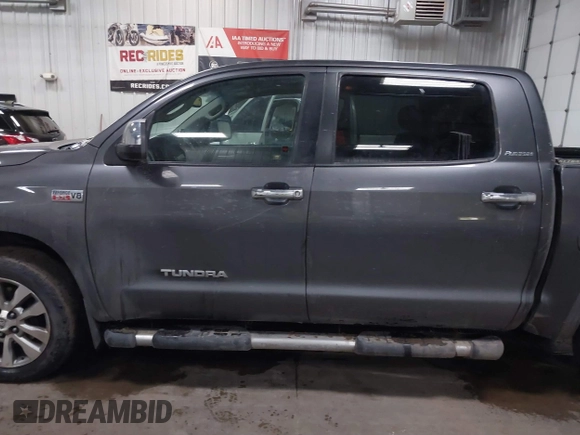 2012 Toyota Tundra 4WD Truck LTD with VIN 5TFHW5F14CX267765, listed as a IAAI auction lot 41345269 with 221,400 mi miles. Bid and sale history available at carsss.com. Image 14.
