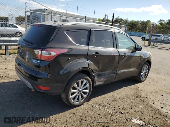 2017 Ford Escape Titanium with VIN 1FMCU9JD3HUD63223, listed as a Copart auction lot 53370004 with 128,666 mi miles and Non Repairable. Bid and sale history available at carsss.com. Image 3.