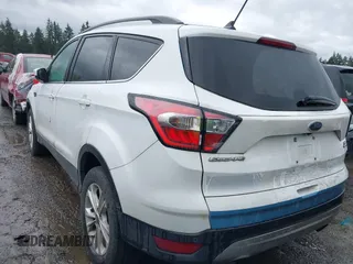 2018 Ford Escape SEL with VIN 1FMCU9HD5JUA42764, listed as a IAAI auction lot 41869026 with 84,958 mi miles. Bid and sale history available at carsss.com. Image 3.