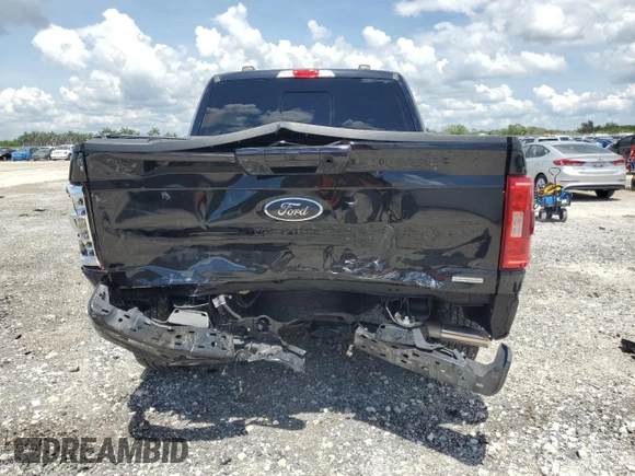 2022 Ford F-150 XL with VIN 1FTFW1E82NFC33590, listed as a Copart auction lot 61806045 with 53,477 mi miles and Salvage title. Bid and sale history available at DreamBid. Image 6.