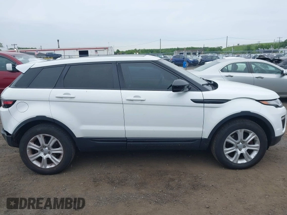 2016 Land Rover Range Rover Evoque SE z VIN SALVP2BG2GH085063, wystawiony jako IAAI lot #42337615 z przebiegiem 99 391 mil mil oraz . Historia ofert i sprzedaży dostępna na DreamBid. Obrazek 13.