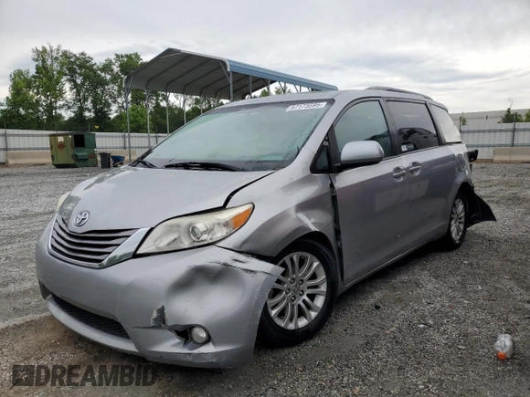 2015 Toyota Sienna XLE с VIN 5TDYK3DC7FS571431, выставлен на аукционе Copart как лот 57173595 с пробегом 305 940 миль миль и Списание • Salvage title. История ставок и продаж доступна на DreamBid. Изображение 1.