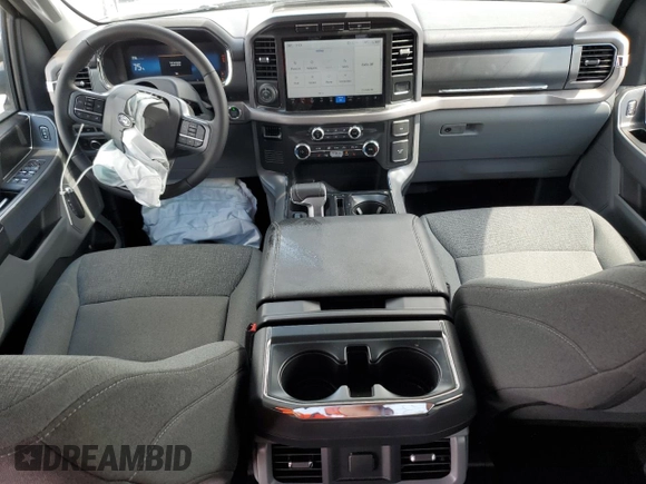 2024 Ford F-150 Lightning XLT with VIN 1FTVW3LK8RWG23783, listed as a Copart auction lot 58359625 with 5,864 mi miles and Salvage title. Bid and sale history available at DreamBid. Image 8.