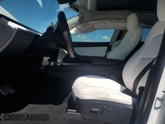 2022 Tesla Model Y Performance with VIN 7SAYGDEF9NF372337, listed as a Copart auction lot 55889345 with 51,099 mi miles and Salvage title. Bid and sale history available at DreamBid. Image 7.