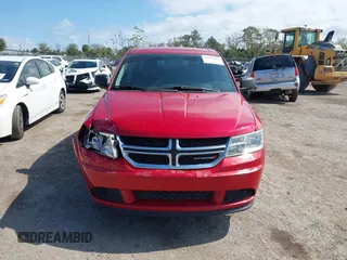 2015 Dodge Journey American Value z VIN 3C4PDCAB4FT679285, wystawiony jako IAAI lot #41600486 z przebiegiem 161 459 mil mil oraz . Historia ofert i sprzedaży dostępna na DreamBid. Obrazek 12.