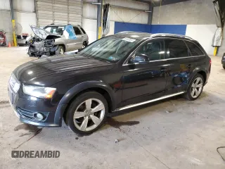 2014 Audi allroad Premium Plus with VIN WA1UFAFL0EA070360, listed as a Copart auction lot 63003984 with 96,499 mi miles and Salvage Title. Bid and sale history available at carsss.com. Image 1.