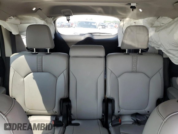 2023 Honda Pilot Touring with VIN 5FNYG2H77PB014212, listed as a Copart auction lot 59222715 with 4,507 mi miles and Salvage title. Bid and sale history available at DreamBid. Image 10.