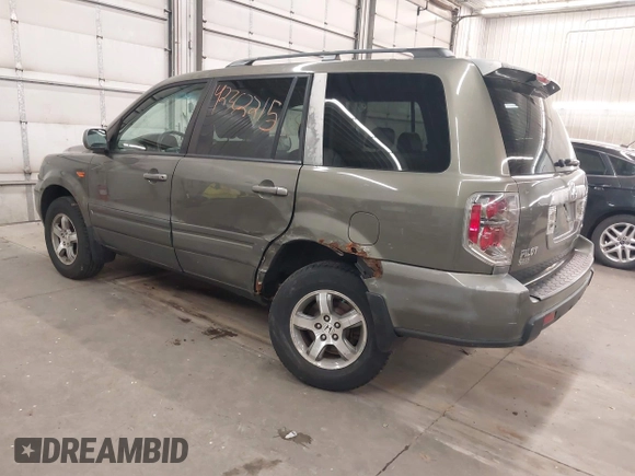 2007 Honda Pilot EX-L z VIN 2HKYF185X7H505077, wystawiony jako IAAI lot #42362215 z przebiegiem 174 592 mil mil oraz . Historia ofert i sprzedaży dostępna na DreamBid. Obrazek 3.