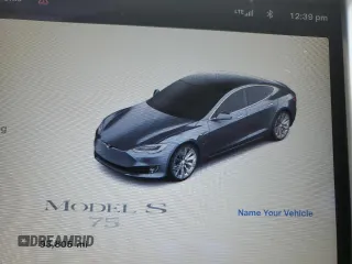 2016 Tesla Model S 70 with VIN 5YJSA1E10GF147377, listed as a Copart auction lot 86799084 with 93,805 mi miles and Salvage Title. Bid and sale history available at DreamBid. Image 9.
