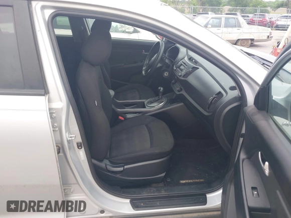 2012 Kia Sportage LX with VIN KNDPBCA24C7214432, listed as a IAAI auction lot 42530116 with 127,623 mi miles and . Bid and sale history available at DreamBid. Image 5.