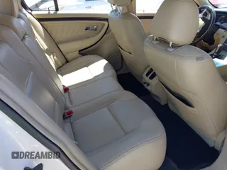 2016 Ford Taurus Limited with VIN 1FAHP2F80GG110898, listed as a IAAI auction lot 41808251 with 95,318 mi miles and . Bid and sale history available at DreamBid. Image 8.