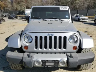2011 Jeep Wrangler Unlimited Sahara with VIN 1J4BA5H16BL627992, listed as a Copart auction lot 76204814 with 197,843 mi miles and Clean Title. Bid and sale history available at carsss.com. Image 6.