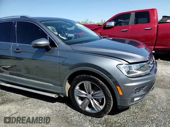 2020 Volkswagen Tiguan SE z VIN 3VV3B7AX8LM102502, wystawiony jako Copart lot #52428635 z przebiegiem 50 778 mil mil oraz Szkody całkowita. Historia ofert i sprzedaży dostępna na DreamBid. Obrazek 14.