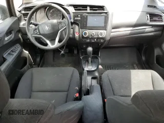 2015 Honda Fit EX-L z VIN 3HGGK5H80FM704920, wystawiony jako Copart lot #59834245 z przebiegiem 86 415 mil mil oraz Szkoda całkowita • Salvage title. Historia ofert i sprzedaży dostępna na DreamBid. Obrazek 8.