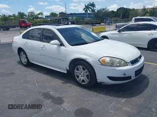 2014 Chevrolet Impala LT with VIN 2G1WB5E33E1153089, listed as a IAAI auction lot 42554631 with 123,852 mi miles and . Bid and sale history available at DreamBid. Image 1.