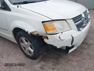 2010 Dodge Grand Caravan SXT with VIN 2D4RN5D17AR408112, listed as a IAAI auction lot 42128842 with 173,862 mi miles and . Bid and sale history available at DreamBid. Image 6.
