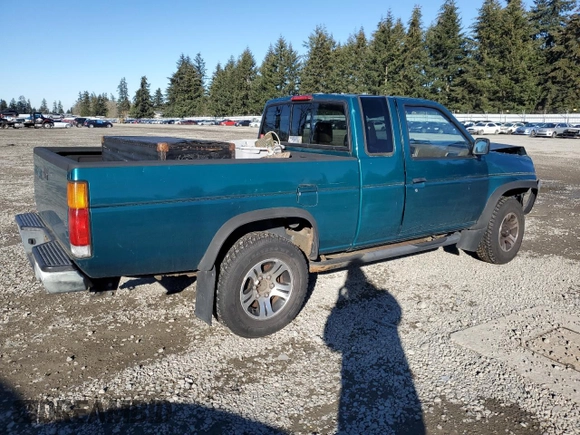 1996 Nissan Frontier XE with VIN 1N6SD16Y9TC338402, listed as a Copart auction lot 45058765 with 164,295 mi miles and Salvage title. Bid and sale history available at DreamBid. Image 3.