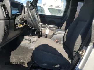 2003 Jeep Wrangler X with VIN 1J4FA39S63P304582, listed as a Copart auction lot 83576014 with 139,002 mi miles and Salvage Title. Bid and sale history available at carsss.com. Image 7.