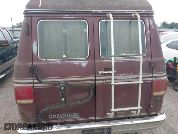 1989 Chevrolet Chevy Van z VIN 1GBEG25K5K7184695, wystawiony jako IAAI lot #42432728 z przebiegiem 945 928 mil mil oraz . Historia ofert i sprzedaży dostępna na DreamBid. Obrazek 6.