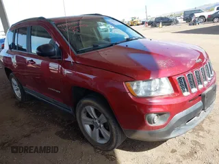 2011 Jeep Compass Latitude with VIN 1J4NT1FB0BD151647, listed as a IAAI auction lot 41950743 with 128,238 mi miles. Bid and sale history available at carsss.com. Image 1.