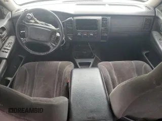 2002 Dodge Dakota SLT z VIN 1B7HG48N22S614075, wystawiony jako Copart lot #57783905 z przebiegiem 247 769 mil mil oraz Szkoda całkowita • Salvage title. Historia ofert i sprzedaży dostępna na DreamBid. Obrazek 8.