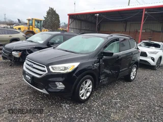 2017 Ford Escape SE with VIN 1FMCU0GD0HUD45409, listed as a IAAI auction lot 41859352 with 52,984 mi miles. Bid and sale history available at carsss.com. Image 2.