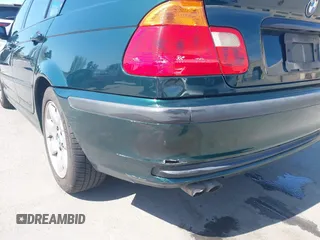 1999 BMW 3 Series 323i with VIN WBAAM3336XFP55691, listed as a IAAI auction lot 42033522 with 129,067 mi miles. Bid and sale history available at carsss.com. Image 6.