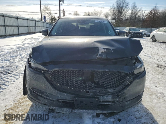 2021 Mazda CX-5 Grand Touring with VIN JM3KFBDM5M1456650, listed as a Copart auction lot 42124045 with 45,205 mi miles and Salvage Title. Bid and sale history available at carsss.com. Image 5.