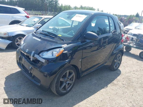 2012 Smart fortwo Pure z VIN WMEEJ3BAXCK526477, wystawiony jako IAAI lot #42392611 z przebiegiem 143 378 mil mil oraz . Historia ofert i sprzedaży dostępna na DreamBid. Obrazek 2.