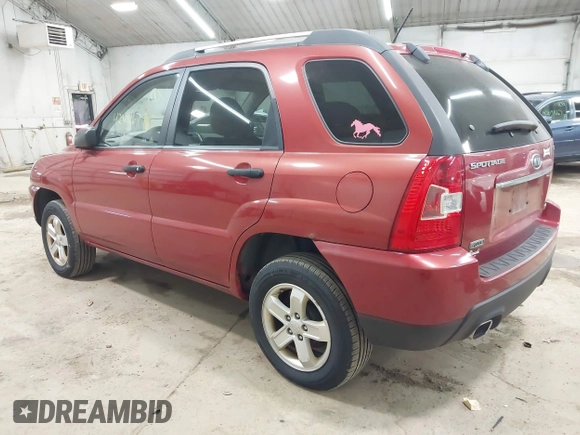 2009 Kia Sportage LX with VIN KNDJE723497555026, listed as a IAAI auction lot 42102679 with 136,398 mi miles. Bid and sale history available at carsss.com. Image 3.