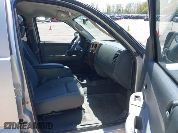 2005 Dodge Dakota SLT with VIN 1D7HW48N45S321002, listed as a IAAI auction lot 42240338 with 214,983 mi miles and . Bid and sale history available at DreamBid. Image 5.