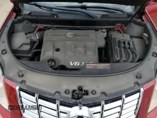 2014 Cadillac SRX Performance Collection z VIN 3GYFNFE38ES560229, wystawiony jako Copart lot #58025485 z przebiegiem 170 344 mil mil oraz Tytuł czysty. Historia ofert i sprzedaży dostępna na DreamBid. Obrazek 12.