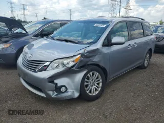 2011 Toyota Sienna XLE AAS with VIN 5TDYK3DCXBS169073, listed as a Copart auction lot 62084925 with 153,888 mi miles and Salvage title. Bid and sale history available at DreamBid. Image 1.