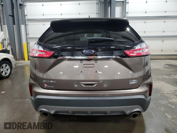 2019 Ford Edge SEL с VIN 2FMPK4J96KBB69644, выставлен на аукционе Copart как лот 58523025 с пробегом 72 024 миль миль и Списание • Salvage title. История ставок и продаж доступна на DreamBid. Изображение 6.