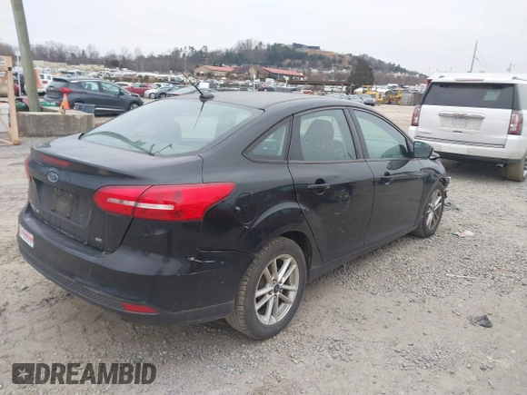 2017 Ford Focus SE with VIN 1FADP3F2XHL269548, listed as a IAAI auction lot 41304096 with 159,085 mi miles and . Bid and sale history available at DreamBid. Image 4.