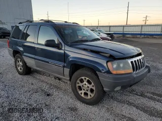 1999 Jeep Grand Cherokee Laredo с VIN 1J4GW58N6XC784679, выставлен на аукционе Copart как лот 85345304 с пробегом 234 584 миль миль и Списание • Salvage title. История ставок и продаж доступна на DreamBid. Изображение 4.