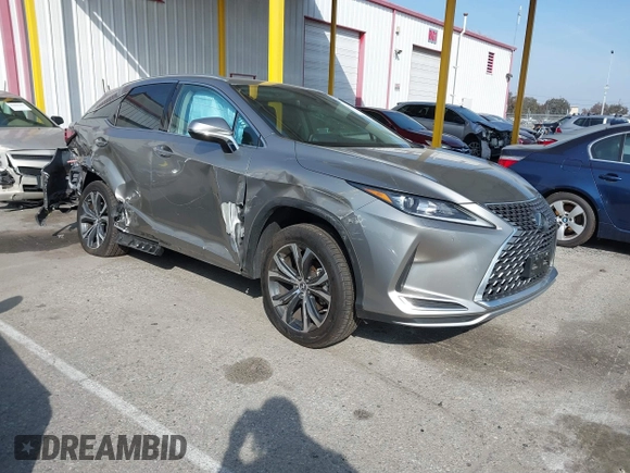 2022 Lexus RX with VIN 2T2HZMAA4NC239034, listed as a IAAI auction lot 41597835 with 33,935 mi miles. Bid and sale history available at carsss.com. Image 1.