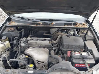 2005 Toyota Camry STD z VIN 4T1BE32K55U005622, wystawiony jako IAAI lot #42418784 z przebiegiem 196 077 mil mil oraz . Historia ofert i sprzedaży dostępna na DreamBid. Obrazek 10.