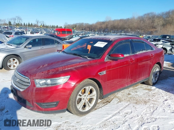 2015 Ford Taurus SEL z VIN 1FAHP2E85FG163421, wystawiony jako IAAI lot #41320489 z przebiegiem 165 618 mil mil oraz . Historia ofert i sprzedaży dostępna na DreamBid. Obrazek 2.