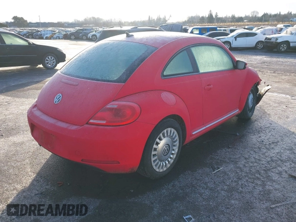 2014 Volkswagen Beetle 2.5L w/Sun with VIN 3VWJP7AT8EM629573, listed as a IAAI auction lot 41479054 with 73,950 mi miles and . Bid and sale history available at DreamBid. Image 4.