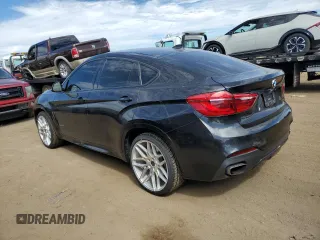 2015 BMW X6 xDrive50i with VIN 5UXKU6C5XF0F94498, listed as a Copart auction lot 67776034 with 106,579 mi miles and Non Repairable. Bid and sale history available at carsss.com. Image 2.