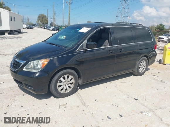 2010 Honda Odyssey EX-L with VIN 5FNRL3H79AB028724, listed as a IAAI auction lot 41687998 with 221,852 mi miles. Bid and sale history available at carsss.com. Image 2.