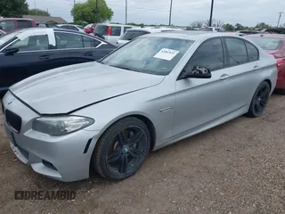 2014 BMW 5 Series 535i z VIN WBA5B1C5XED917358, wystawiony jako IAAI lot #42082611 z przebiegiem 129 199 mil mil oraz . Historia ofert i sprzedaży dostępna na DreamBid. Obrazek 2.