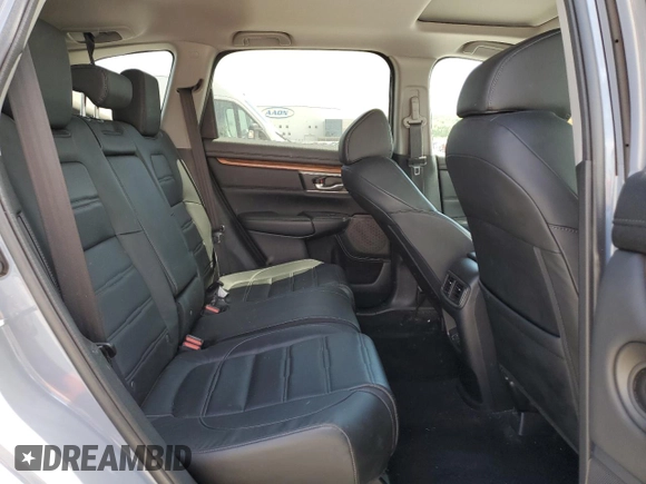 2020 Honda CR-V Touring z VIN 7FART6H93LE013954, wystawiony jako Copart lot #56970555 z przebiegiem 134 931 mil mil oraz Szkoda całkowita • Salvage title. Historia ofert i sprzedaży dostępna na DreamBid. Obrazek 11.
