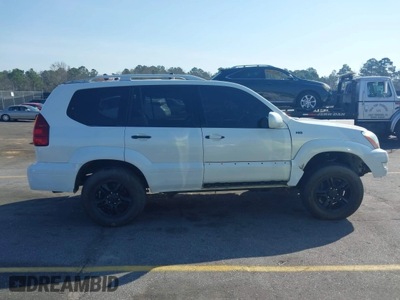 2004 Lexus GX 470 with VIN JTJBT20XX40063036, listed as a IAAI auction lot 41780865 with 222,285 mi miles. Bid and sale history available at carsss.com. Image 13.