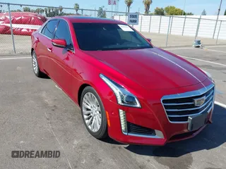 2015 Cadillac CTS Performance RWD with VIN 1G6AS5SX4F0136097, listed as a IAAI auction lot 42613633 with 173,103 mi miles and . Bid and sale history available at DreamBid. Image 1.