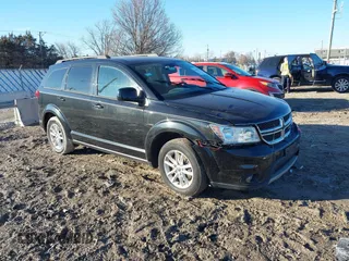 2013 Dodge Journey SXT with VIN 3C4PDCBB3DT564737, listed as a IAAI auction lot 41666723 with 169,486 mi miles. Bid and sale history available at carsss.com. Image 1.
