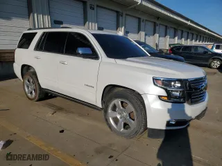 2018 Chevrolet Tahoe Premier with VIN 1GNSCCKC2JR131282, listed as a Copart auction lot 84832944 with 127,170 mi miles and Salvage Title. Bid and sale history available at carsss.com. Image 4.
